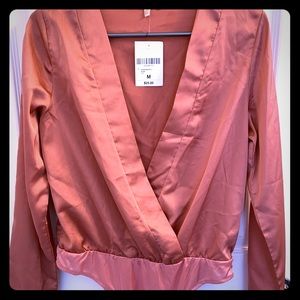 Rose-gold low-cut body suit!